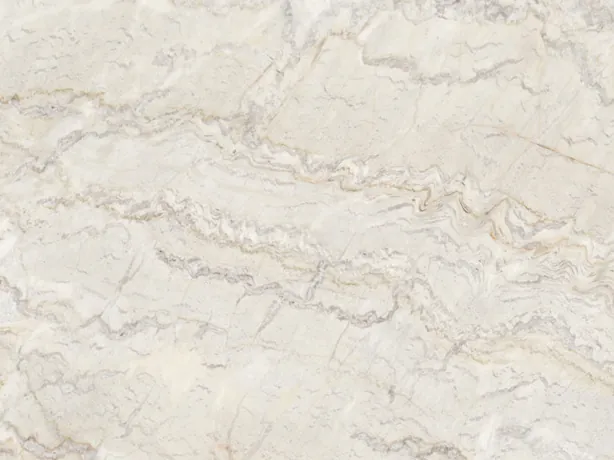 Detalle de la Cuarcita Dolce Vita con sus vetas onduladas grises y beige