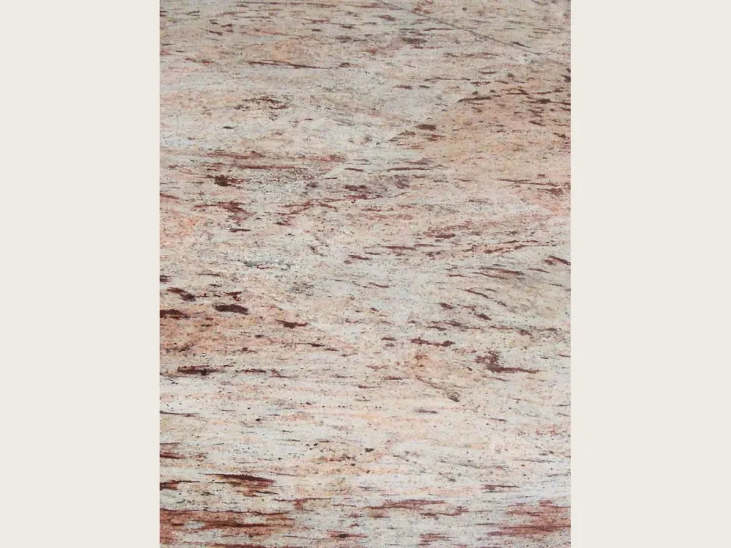 Placa de granito beige Ivory Brown: fondo marfil con trazos horizontales rojizos y burdeos