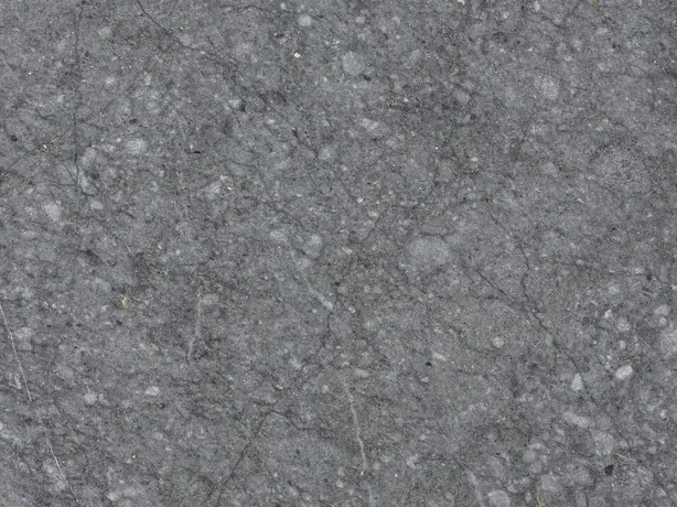 Detalle de la placa de Azul Masaccio: motas grises claras sobre el fondo oscuro mate