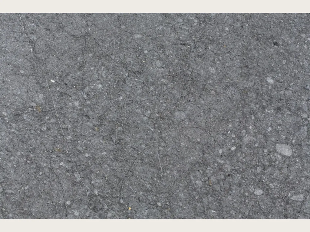 Placa de Mármol Azul Masaccio: gris oscuro uniforme con motas y fragmentos grises claros dispersos