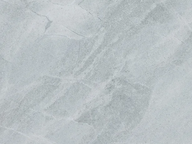 Detalle de la placa de Mármol Bleu de Savoie: vetas claras finas en red sobre el gris azulado