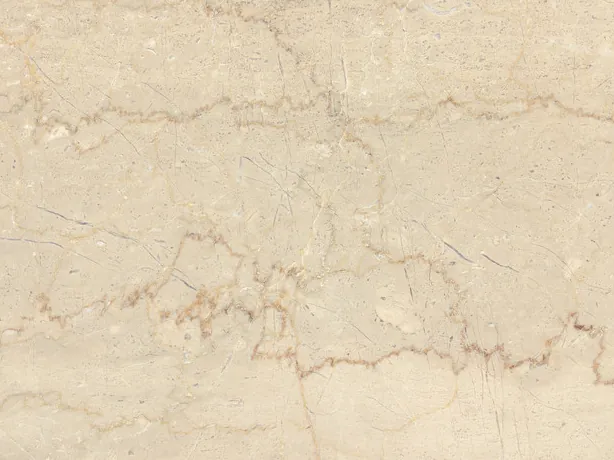 Detalle del mármol beige Botticino Semiclassico: veta dentada marrón rojizo sobre el beige crema
