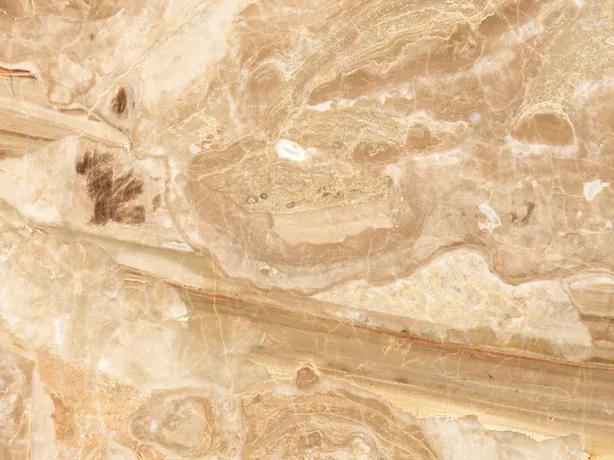 Detalle del Mármol Breccia Oniciata: ondas concéntricas beige en el dibujo brechado