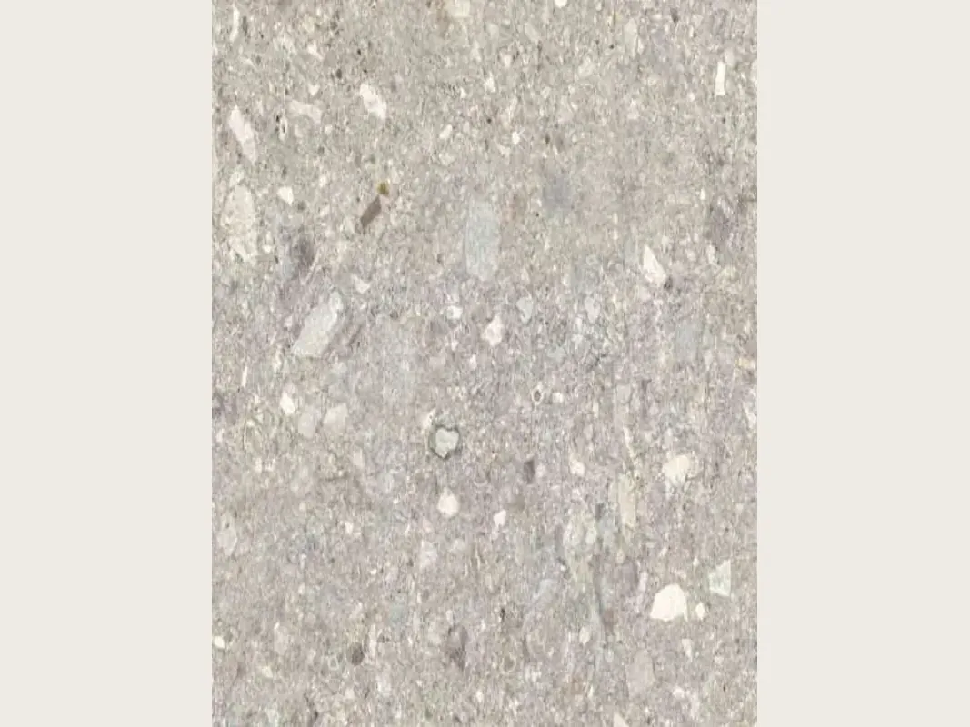Placa de mármol gris Ceppo di Gré: gris claro con pequeños fragmentos beige y grises repartidos