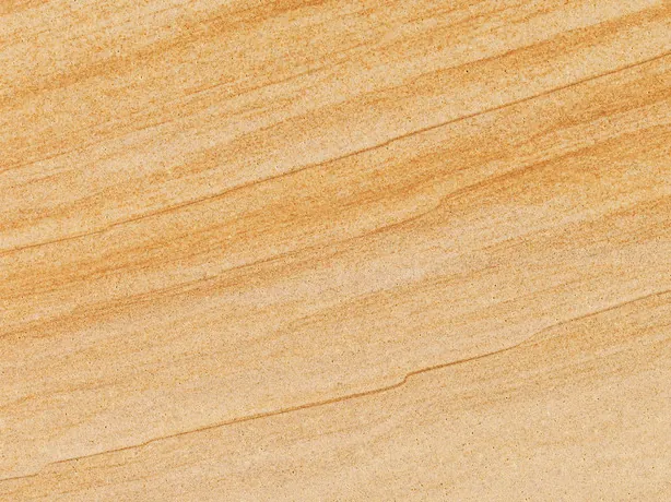 Detalle del Mármol Douglas: bandas paralelas ocre y crema y superficie mate