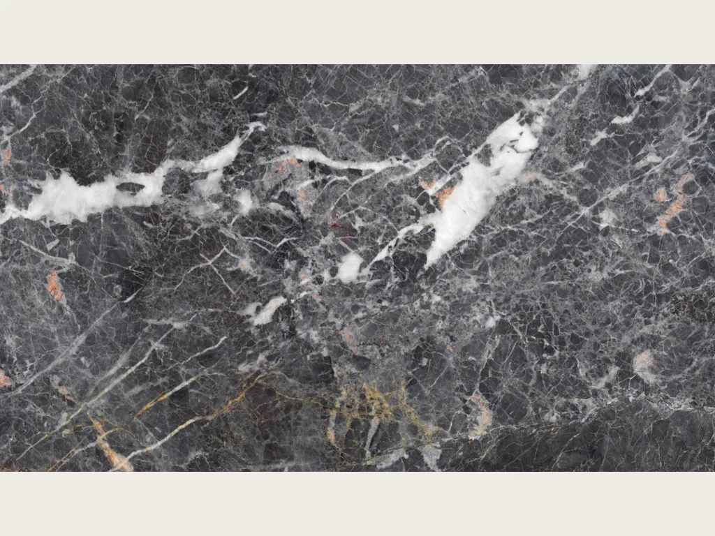 Placa de mármol gris Grey Saint Laurent: fondo gris carbón con manchas blancas alargadas y red fina de vetas claras
