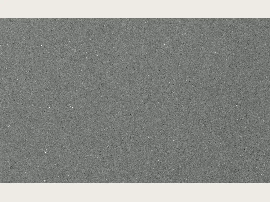Placa de Mármol Gris Aitos: gris medio granulado con puntos finos claros y oscuros, sin vetas