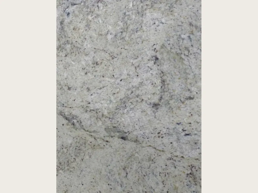 Placa de mármol gris Lemon Ice: fondo gris claro moteado, con motas oscuras y una franja ondulada más oscura