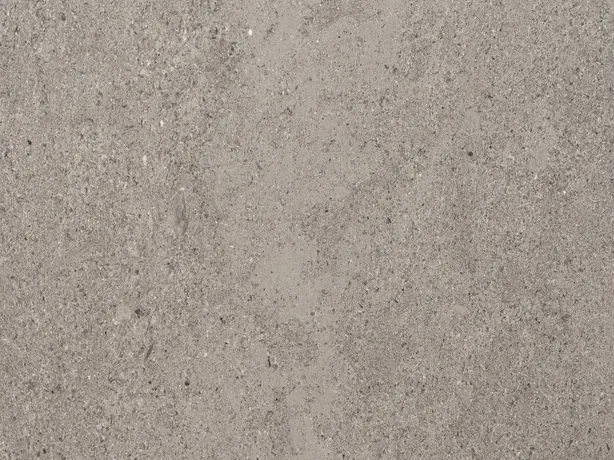 Detalle del mármol gris Lipica Unito: granulado fino y uniforme en tono gris beige
