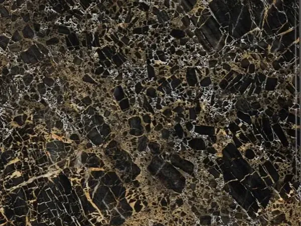 Placa de Mármol Portoro: fragmentos negros separados por una red densa de vetas doradas y blancas