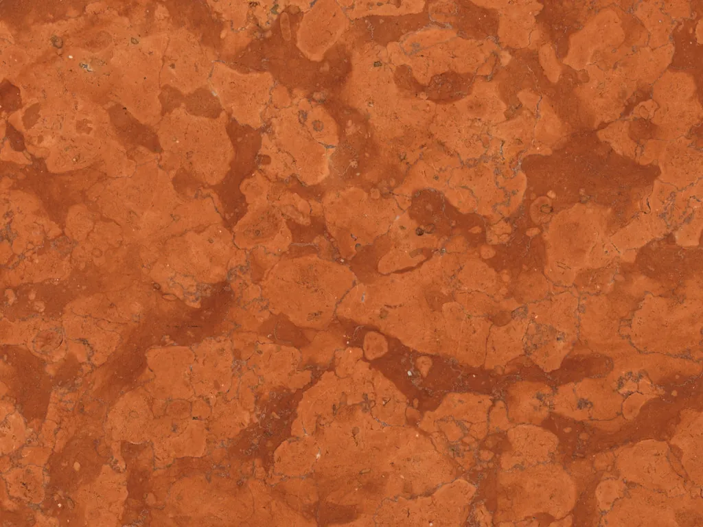 Placa de Mármol Rojo Asiago: fondo naranja rojizo con manchas claras redondeadas, sin vetas
