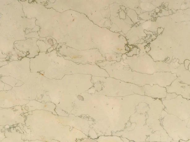 Detalle del Mármol Verdello: líneas grises finas e irregulares sobre el beige crema