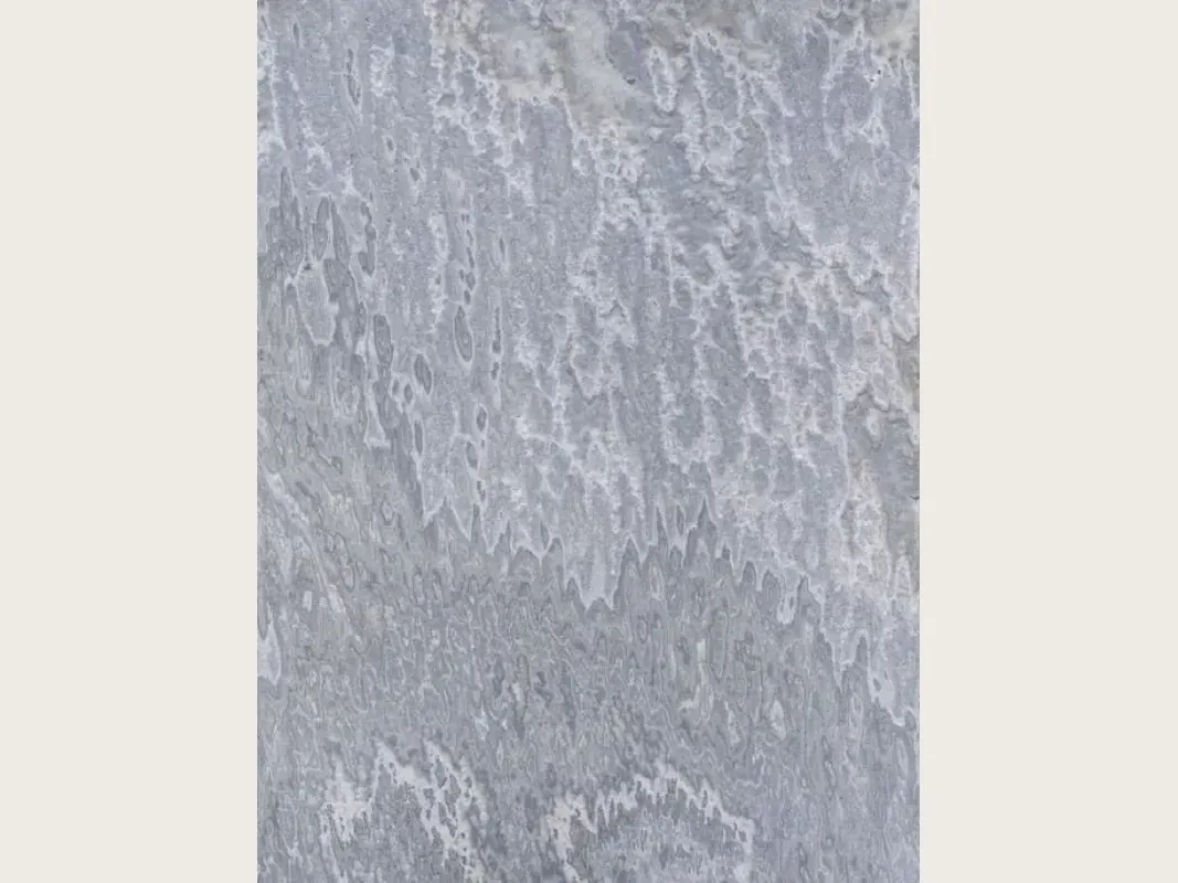 Placa de ónix gris Vulcano: manchas claras onduladas que caen en vertical sobre gris azulado
